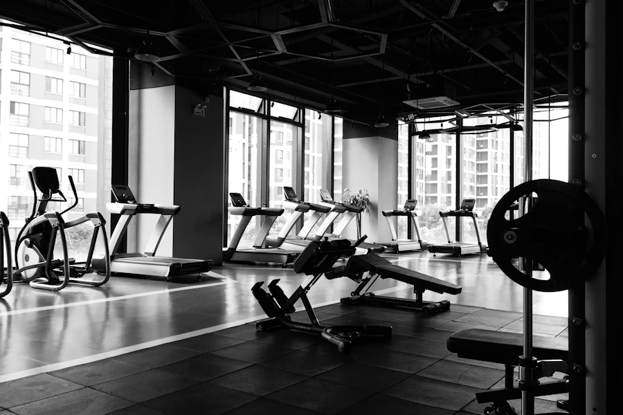Diverse members exercising in a welcoming gym environment