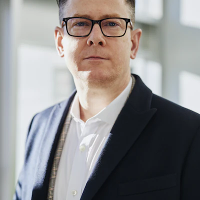 Portrait of Michael Thompson, a man and FitCore member